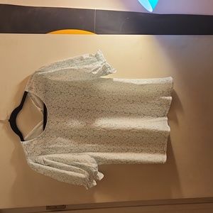 white with blue spots shirt